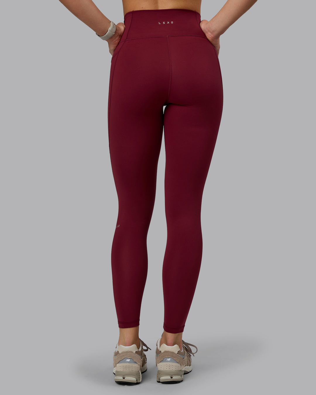 Woman wearing Fusion Ultra High-Rise Full Length Legging Pockets - Cordovan | Model:Chloe | Size:XS