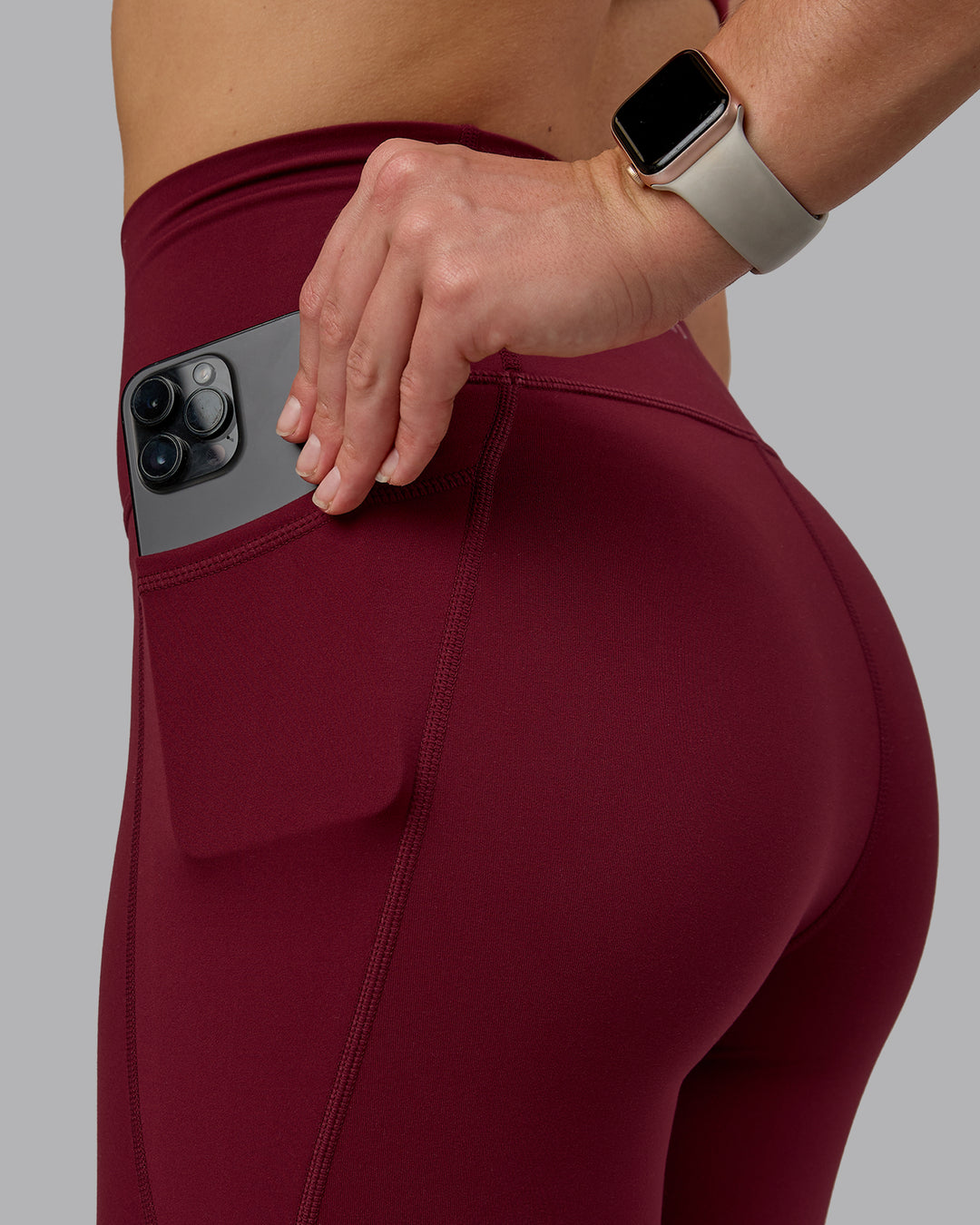 Woman wearing Fusion Ultra High-Rise Full Length Legging Pockets - Cordovan | Model:Chloe | Size:XS