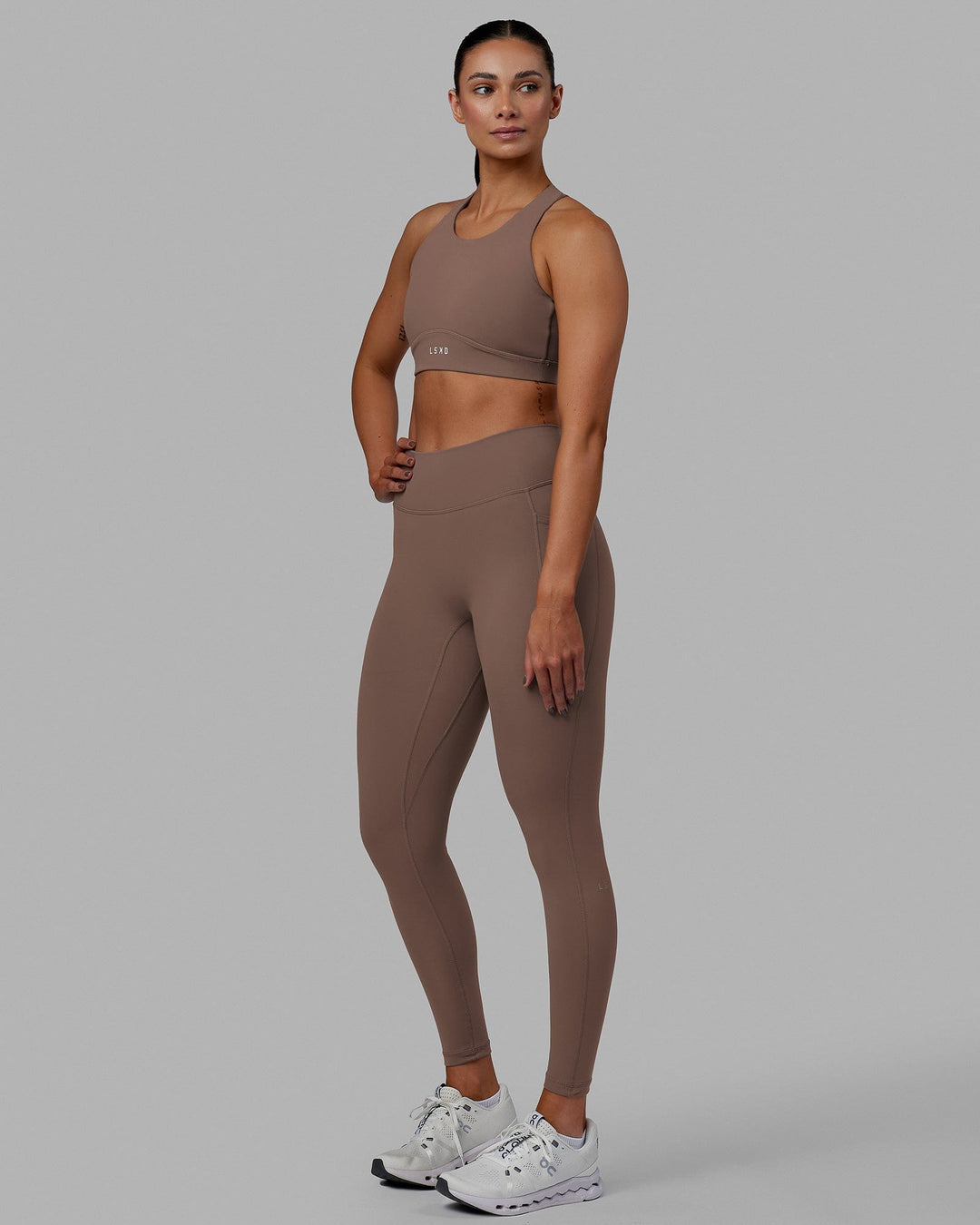 Woman wearing Fusion Ultra High-Rise Full Length Legging Pockets - Deep Taupe | Model:Blaize | Size:S