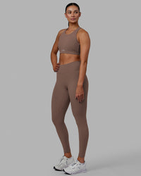Woman wearing Fusion Ultra High-Rise Full Length Legging Pockets - Deep Taupe | Model:Blaize | Size:S