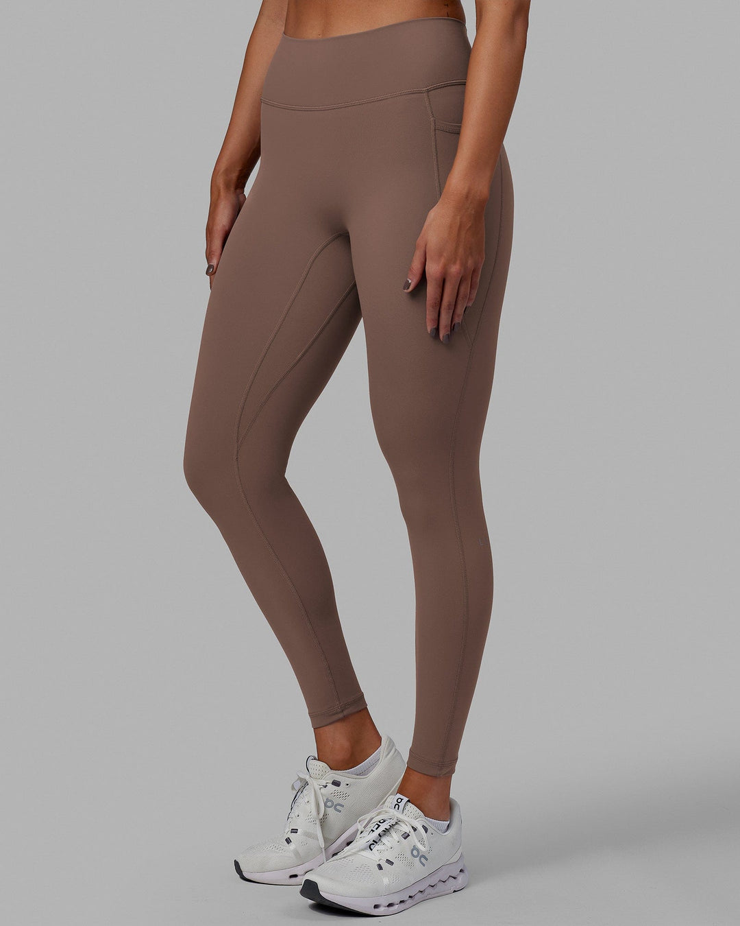 Woman wearing Fusion Ultra High-Rise Full Length Legging Pockets - Deep Taupe | Model:Blaize | Size:S