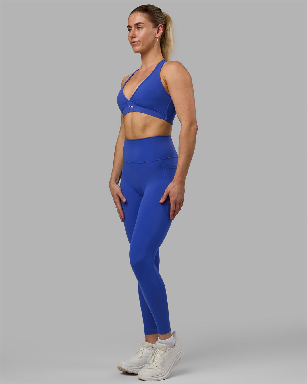 Woman wearing Fusion Ultra High-Rise Full Length Legging Pockets - Power Cobalt | Model:Hannah | Size:S