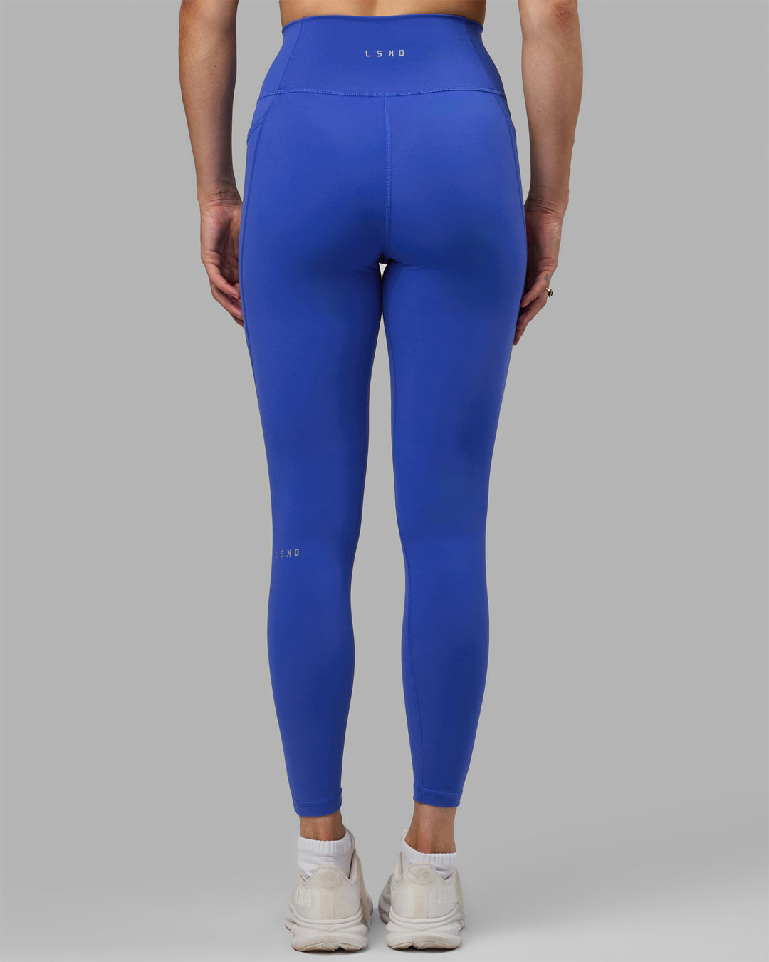 Woman wearing Fusion Ultra High-Rise Full Length Legging Pockets - Power Cobalt | Model:Hannah | Size:S