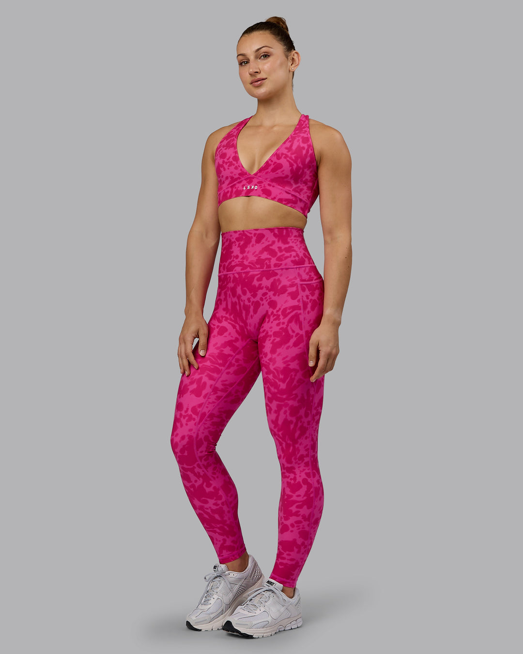 Woman wearing Fusion Ultra High-Rise Full Length Legging Pockets - Strawberry-Lava Lamp | Model:Zoe | Size:S