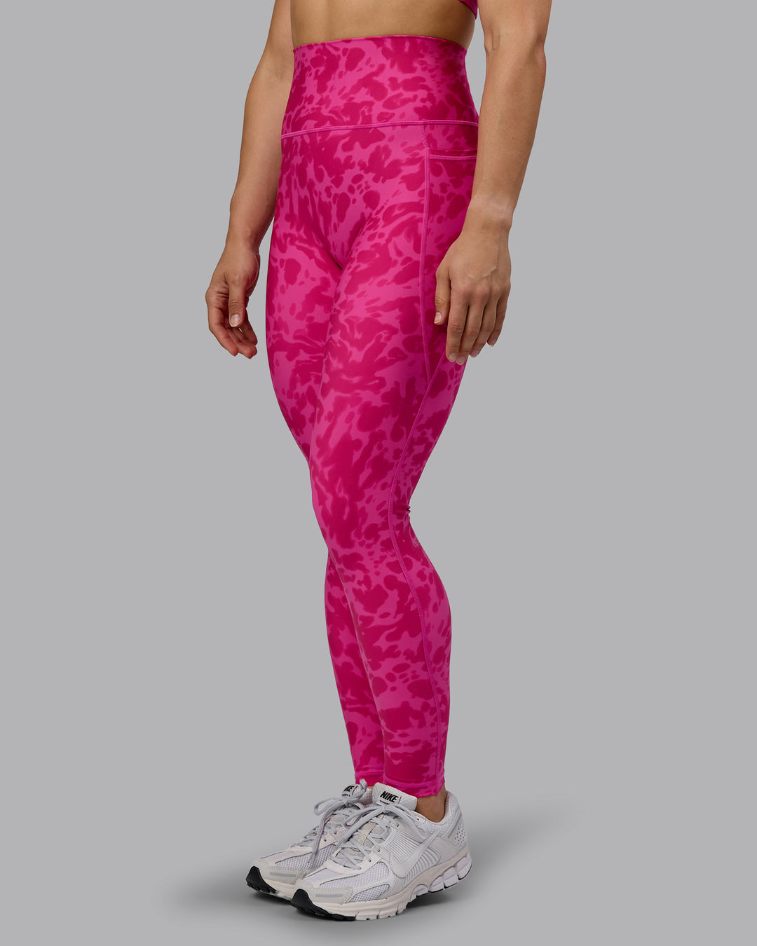 Woman wearing Fusion Ultra High-Rise Full Length Legging Pockets - Strawberry-Lava Lamp | Model:Zoe | Size:S
