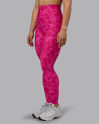Woman wearing Fusion Ultra High-Rise Full Length Legging Pockets - Strawberry-Lava Lamp | Model:Zoe | Size:S