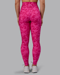 Woman wearing Fusion Ultra High-Rise Full Length Legging Pockets - Strawberry-Lava Lamp | Model:Zoe | Size:S