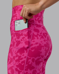 Woman wearing Fusion Ultra High-Rise Full Length Legging Pockets - Strawberry-Lava Lamp | Model:Zoe | Size:S