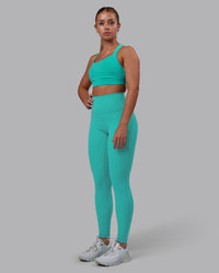 Woman wearing Fusion Ultra High-Rise Full Length Legging Pockets - Turquoise Tide | Model:Hannah | Size:S