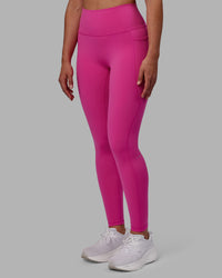 Woman wearing Fusion Ultra High-Rise Full Length Legging Pockets - Fuchsia Pink | Model:Sophie | Size:S