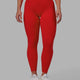 Woman wearing Fusion Full Length Tights - Infrared