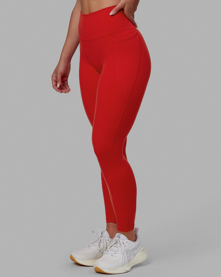 Woman wearing Fusion Full Length Tights - Infrared