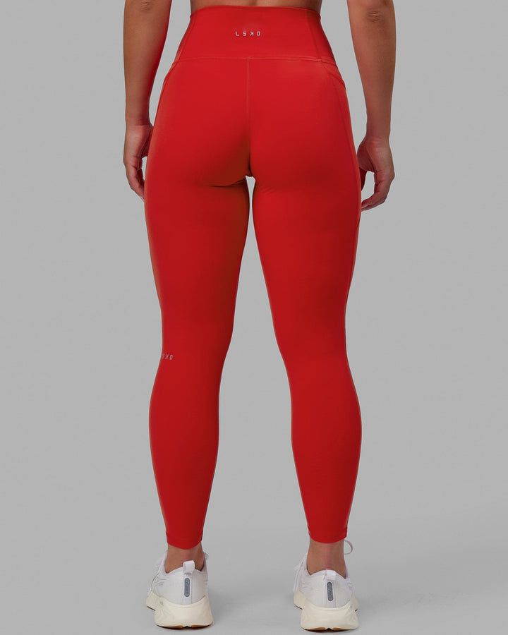 Woman wearing Fusion Full Length Tights - Infrared
