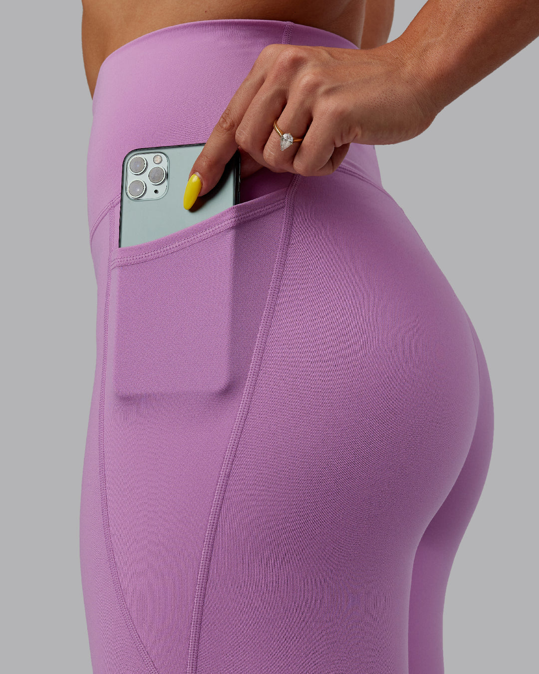 Woman wearing Fusion Ultra High-Rise Full Length Legging Pockets - Light Violet | Model:Bree | Size:S