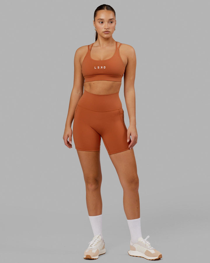 Model wearing Fusion Mid Short Tight - Auburn