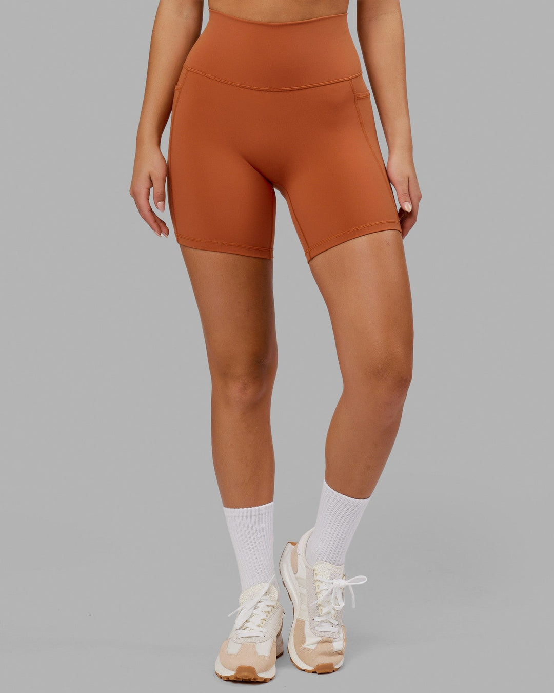 Model wearing Fusion Mid Short Tight - Auburn
