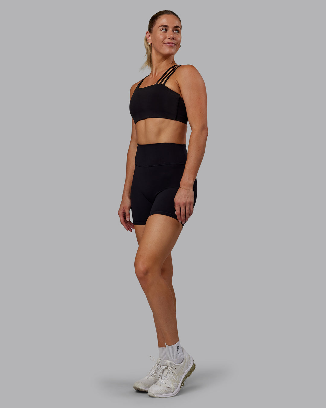 Woman wearing Fusion Ultra High-Rise 6&quot; Short - Black | Model:Hannah | Size:S
