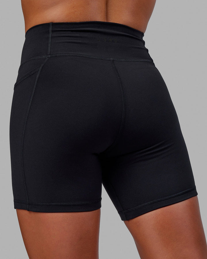 Woman wearing Fusion Mid Short Tights - Black-Black