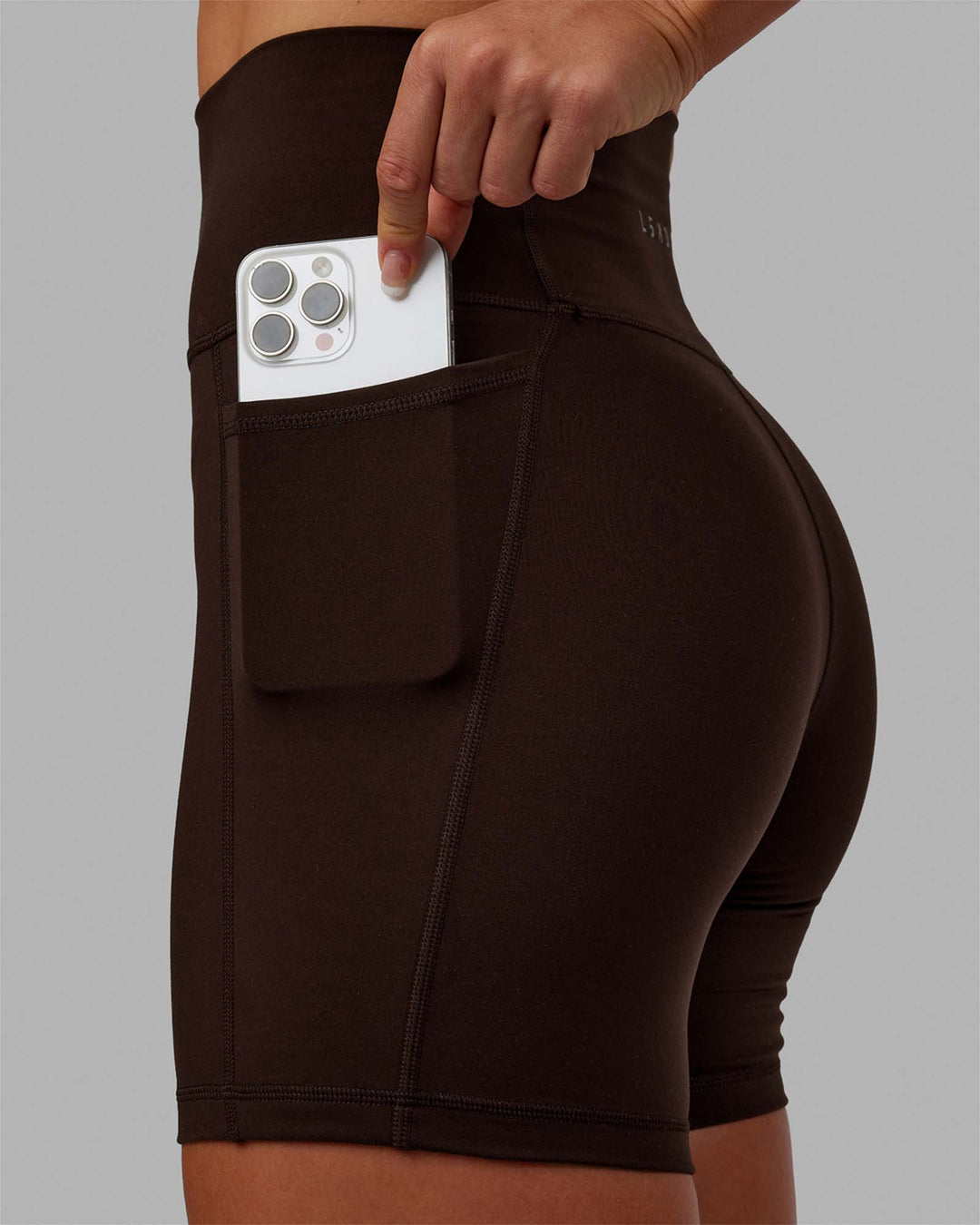 Woman wearing Fusion Mid Short Tights - Dark Chocolate