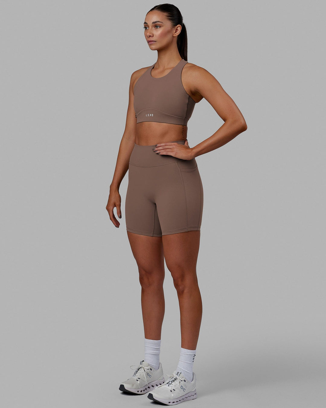 Woman wearing Fusion Mid Short Tight - Deep Taupe