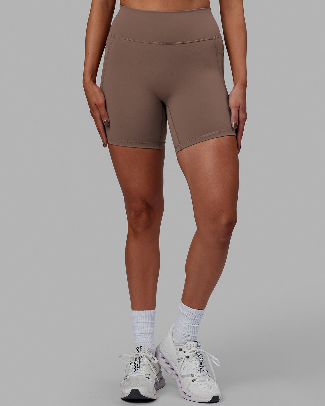 Woman wearing Fusion Mid Short Tight - Deep Taupe