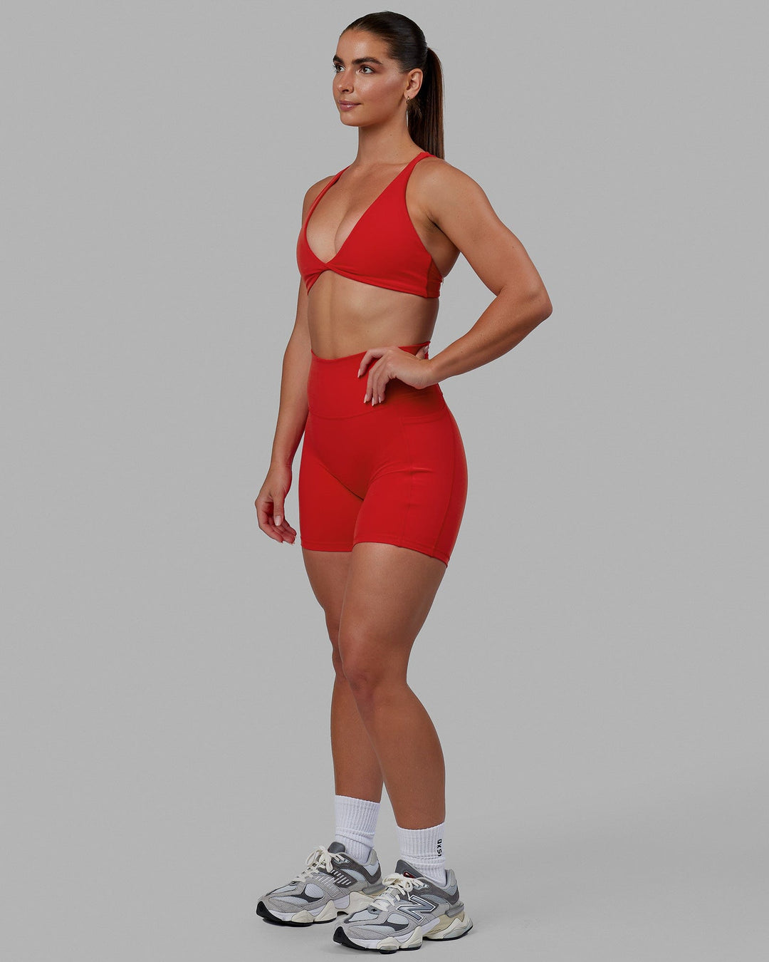Woman wearing Fusion Mid Short Tights - Infrared