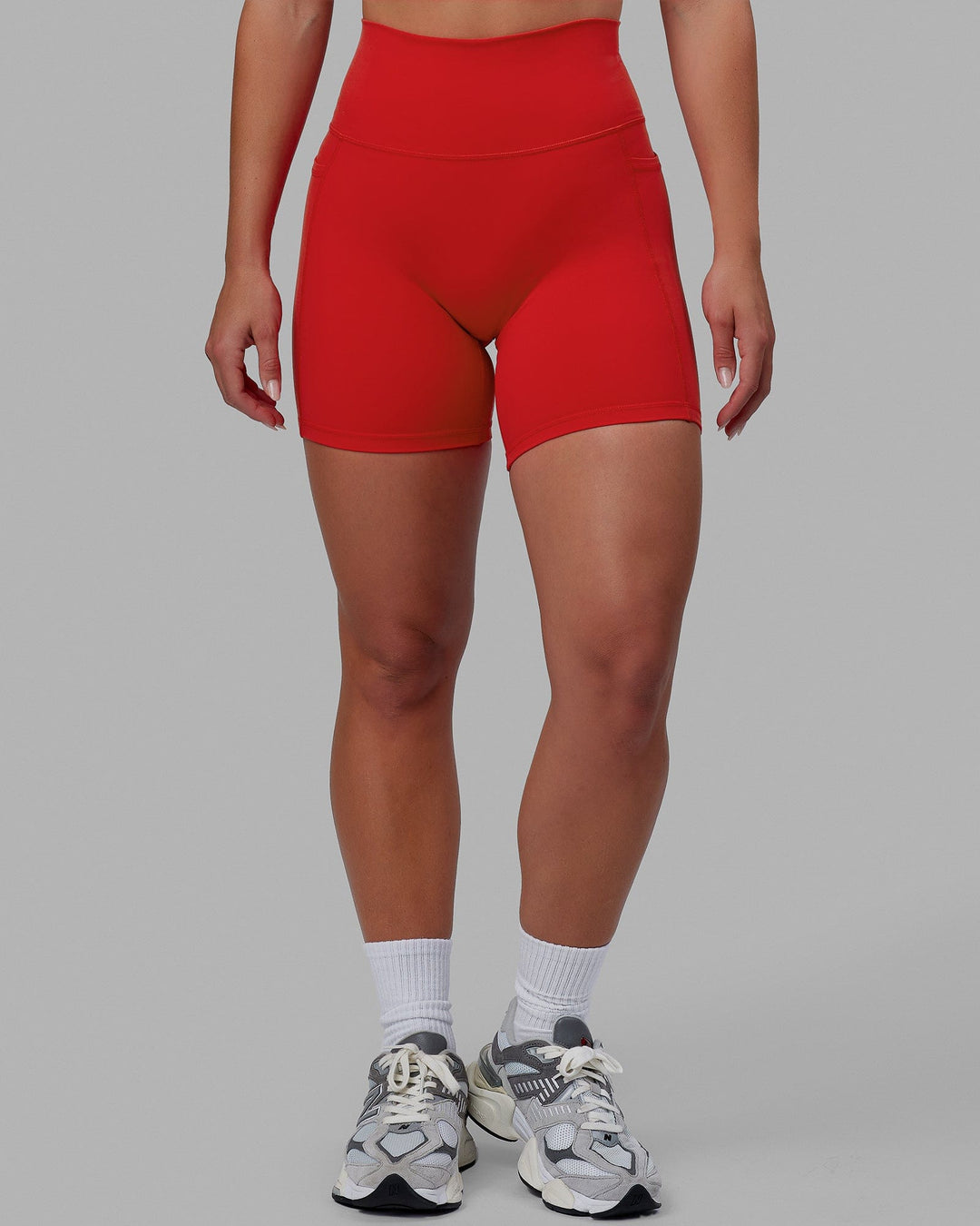 Woman wearing Fusion Mid Short Tights - Infrared