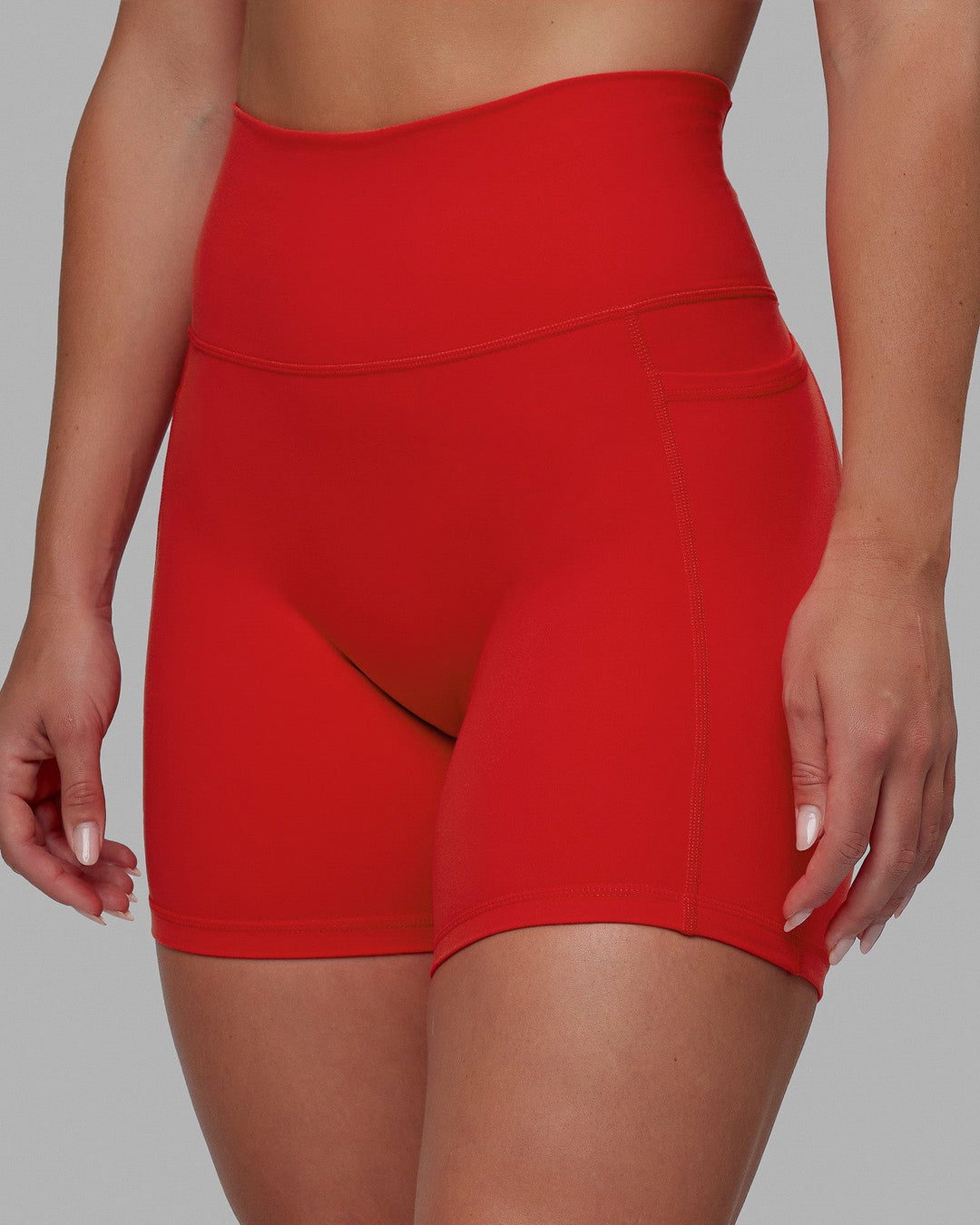 Woman wearing Fusion Mid Short Tights - Infrared
