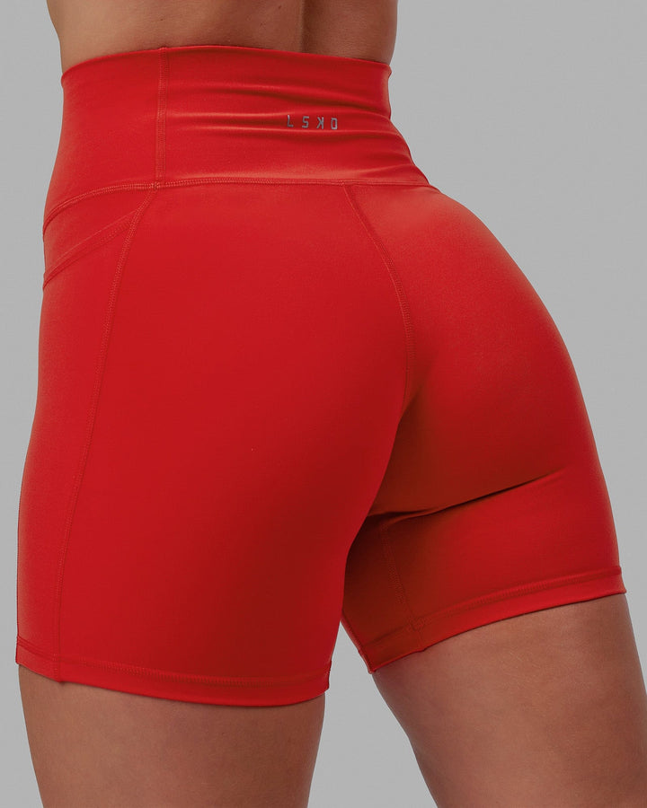 Woman wearing Fusion Mid Short Tights - Infrared