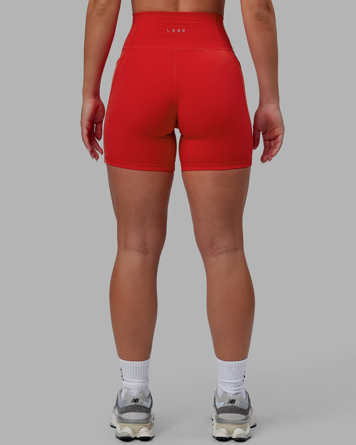 Woman wearing Fusion Mid Short Tights - Infrared