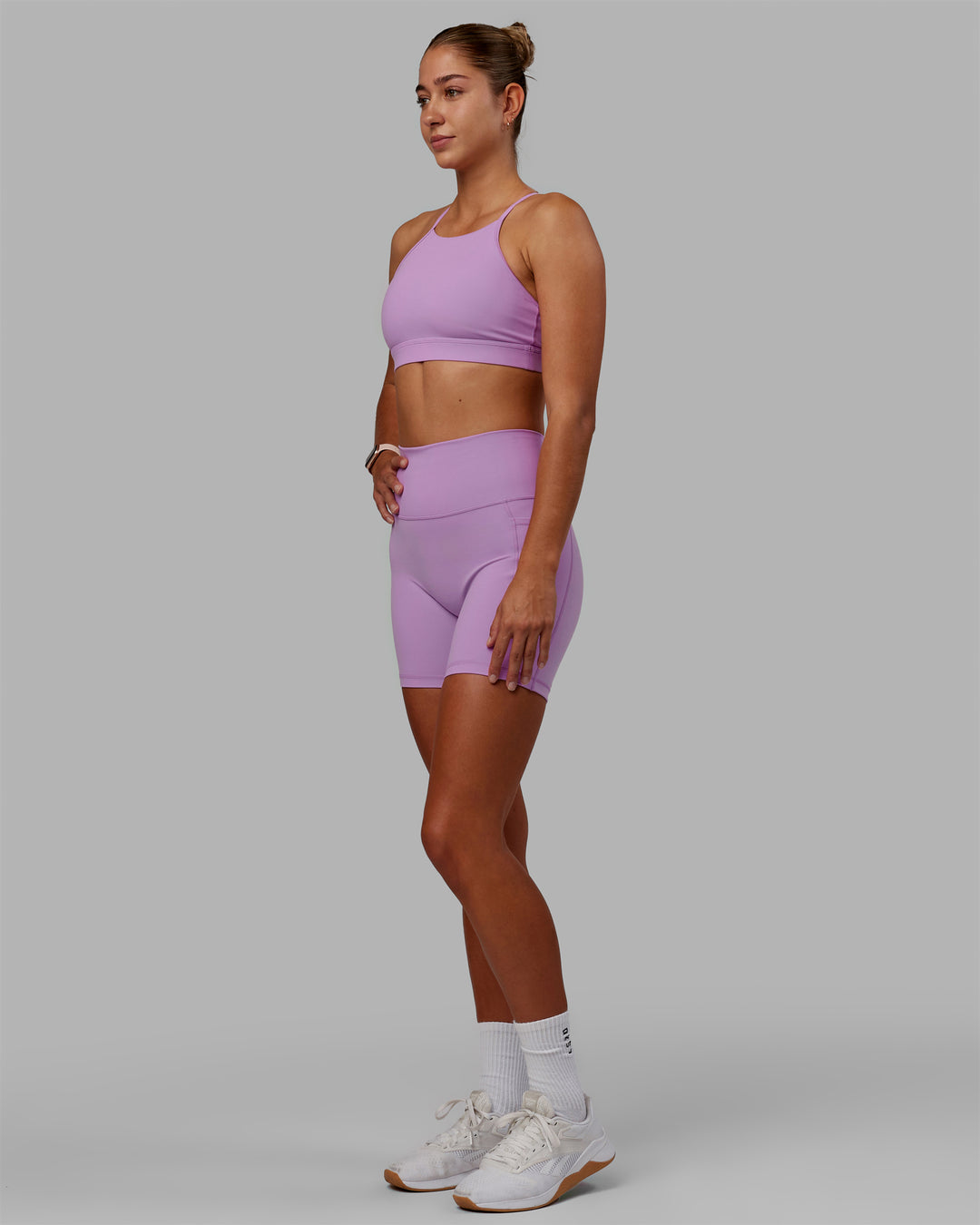 Woman wearing Fusion Ultra High-Rise 6&quot; Short Pockets - Light Violet | Model:Asia | Size:S