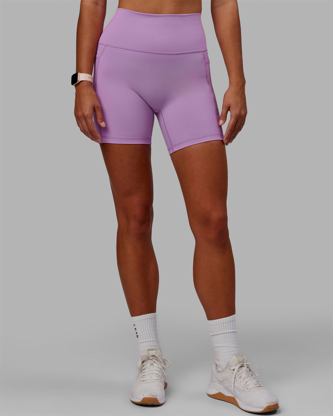 Woman wearing Fusion Ultra High-Rise 6&quot; Short Pockets - Light Violet | Model:Asia | Size:S