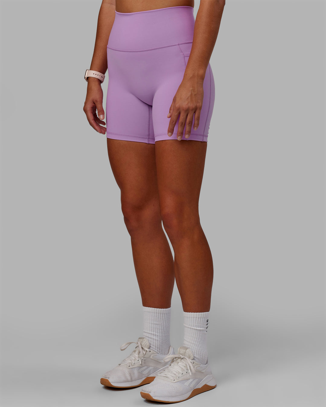 Woman wearing Fusion Ultra High-Rise 6&quot; Short Pockets - Light Violet | Model:Asia | Size:S