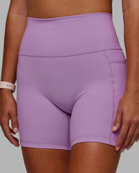 Woman wearing Fusion Ultra High-Rise 6" Short Pockets - Light Violet | Model:Asia | Size:S
