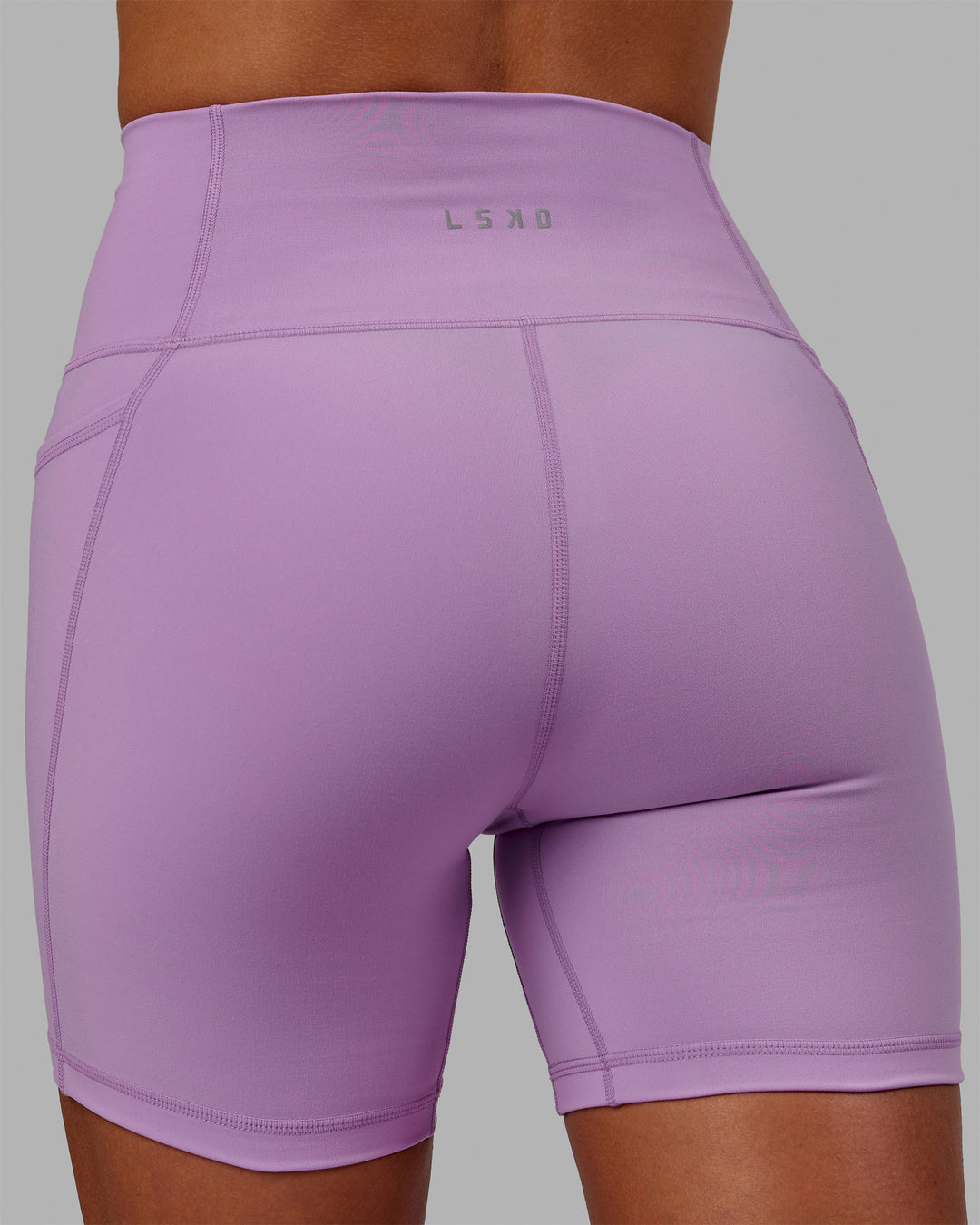 Woman wearing Fusion Ultra High-Rise 6&quot; Short Pockets - Light Violet | Model:Asia | Size:S