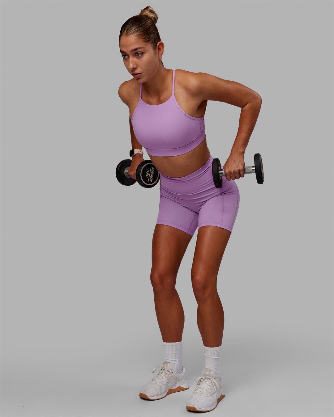 Woman wearing Fusion Ultra High-Rise 6&quot; Short Pockets - Light Violet | Model:Asia | Size:S