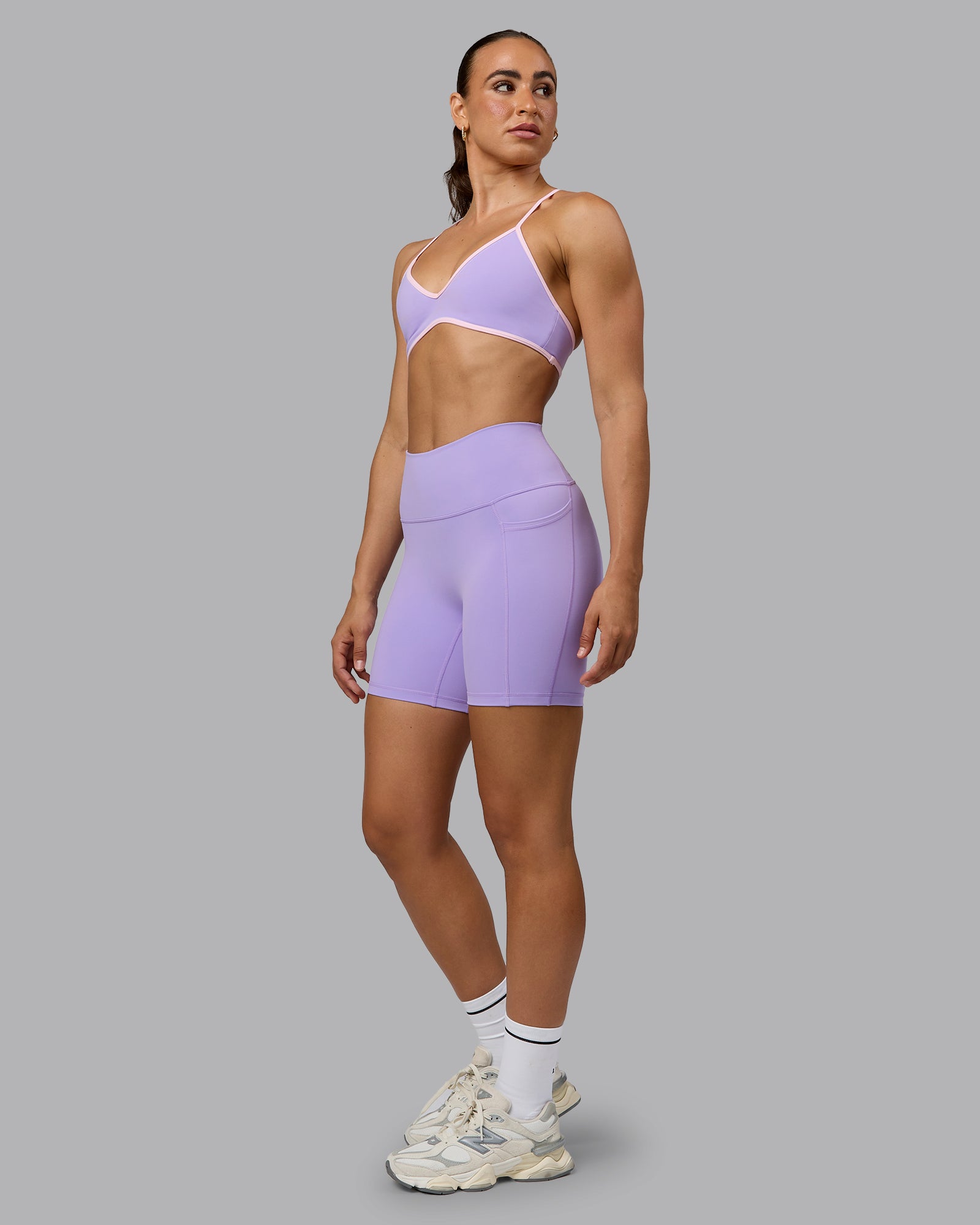 Woman wearing Fusion Ultra High-Rise 6" Short Pockets - Pale Lilac | Model:Sophie | Size:S