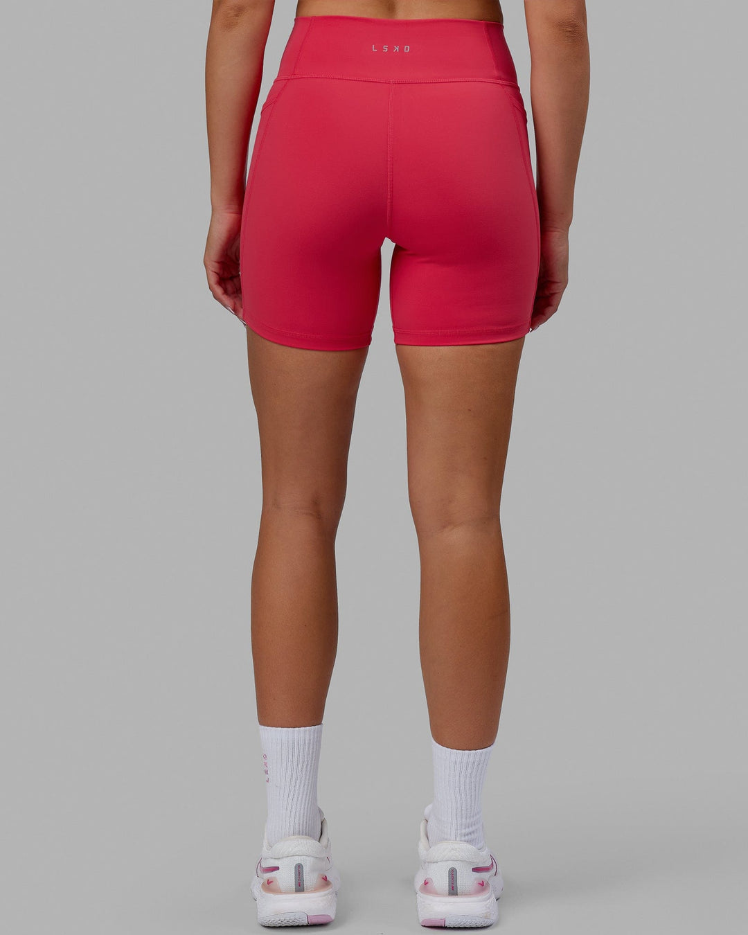 Woman wearing Fusion Mid Short Tights - Raspberry