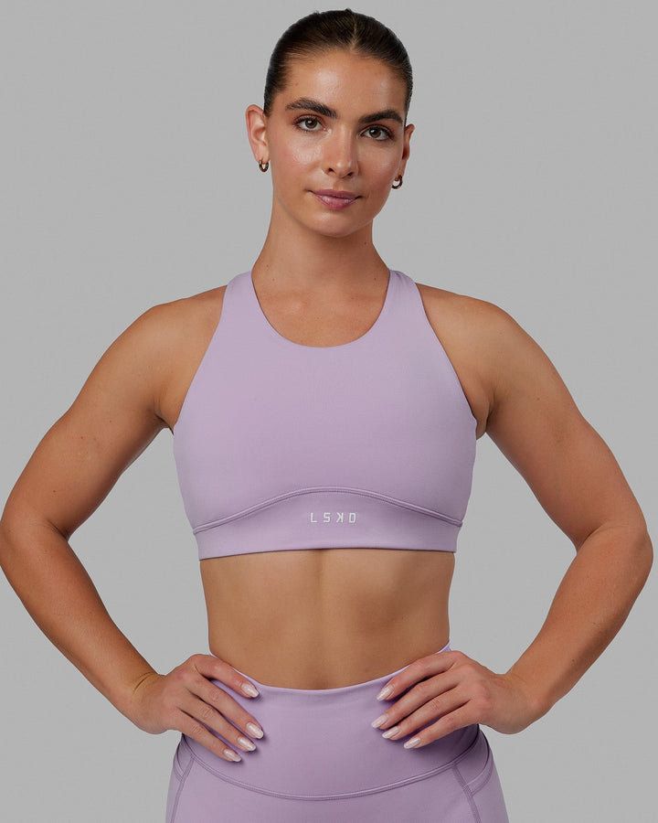 Woman wearing Fusion Sports Bra - Pale Lilac