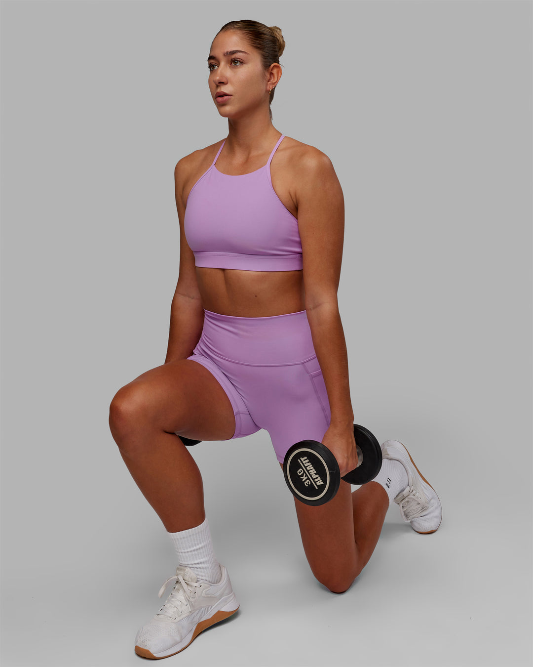 Woman wearing Fusion Ultra High-Rise 4&quot; Short Pockets - Light Violet | Model:Asia | Size:S