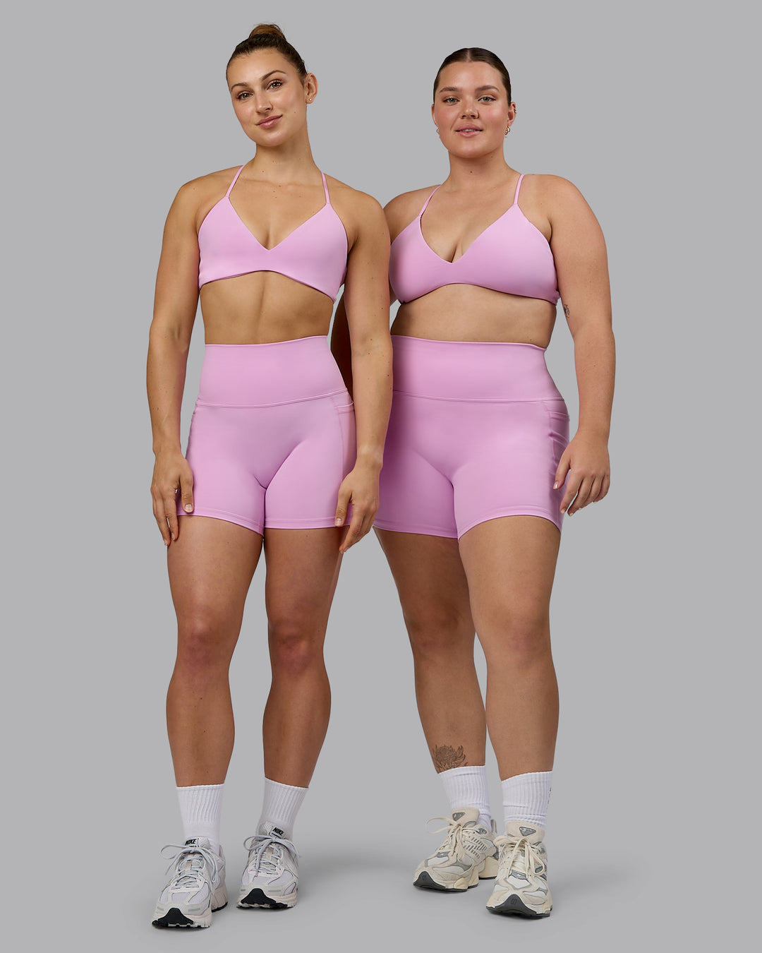 Woman wearing Fusion Ultra High-Rise 4&quot; Short Pockets - Pastel Orchid | Model:Both | Size:Duo