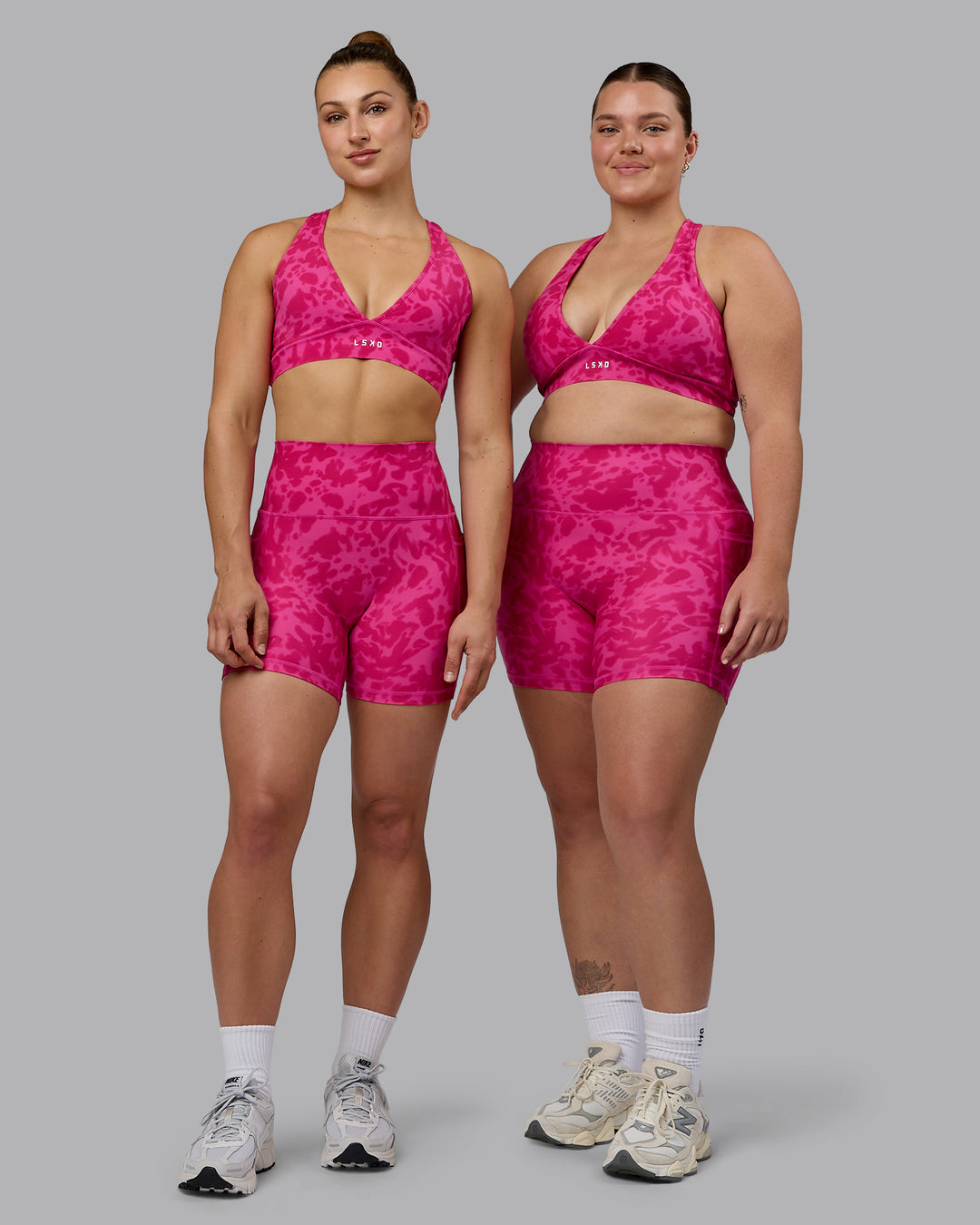 Woman wearing Fusion Ultra High-Rise 4&quot; Short Pockets - Strawberry-Lava Lamp | Model:Both | Size:Duo
