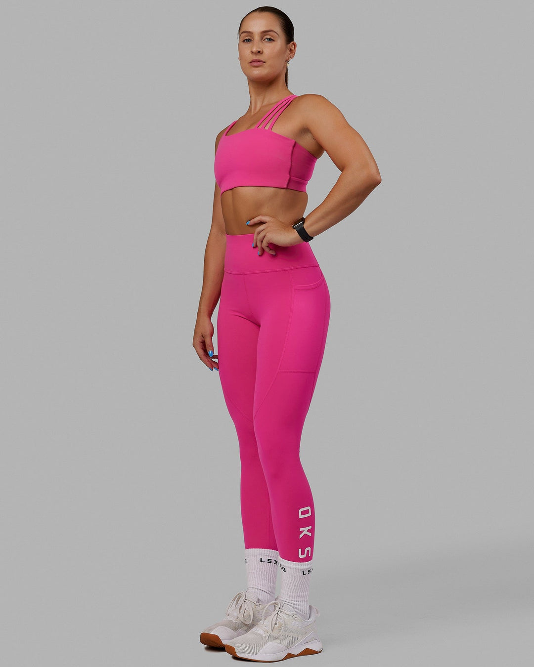 Woman wearing Galvanise Sports Bra - Ultra Pink