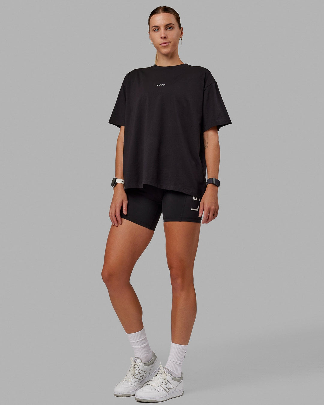 Woman wearing Go-To FLXCotton Oversized Tee - Black-White