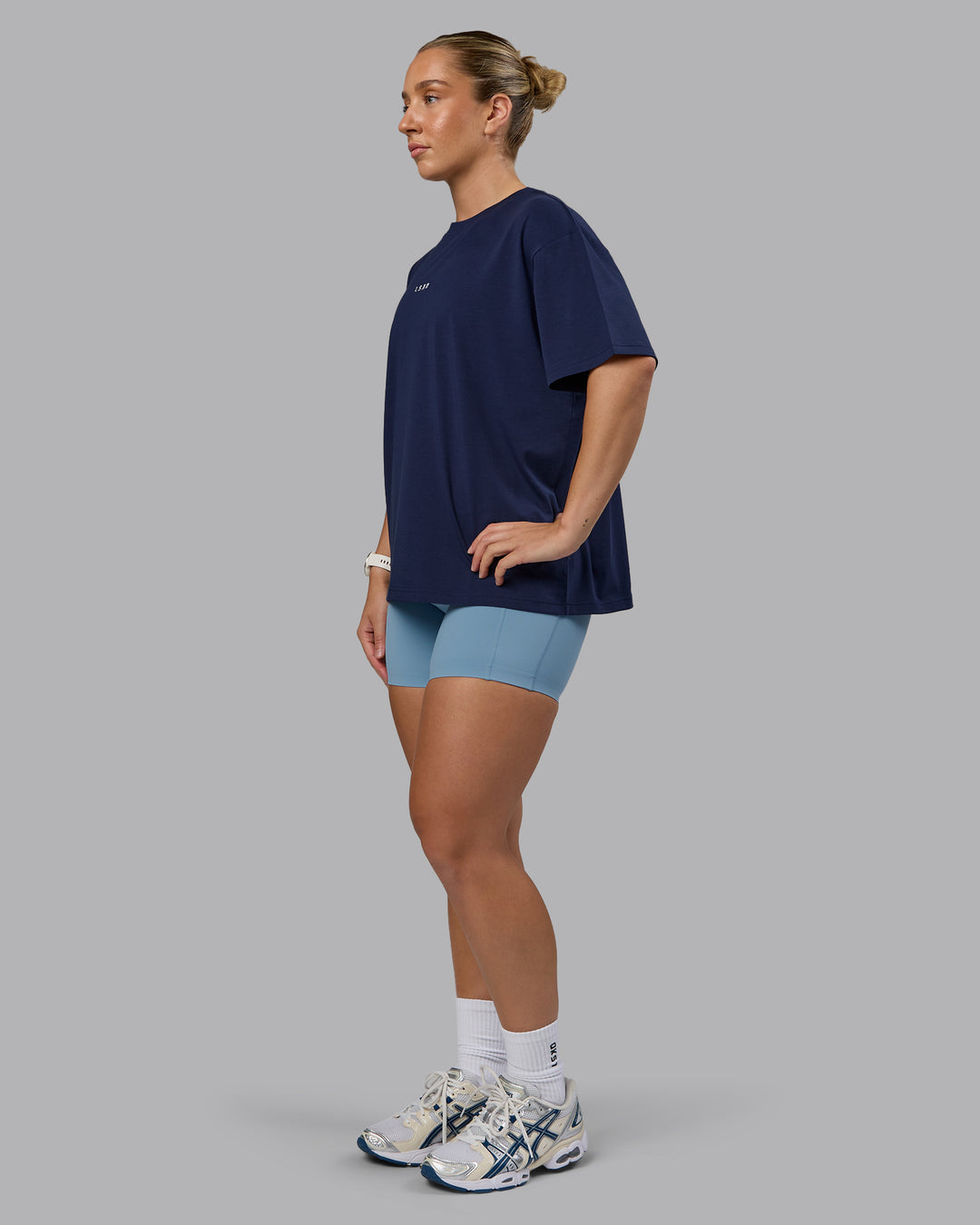 Woman wearing Go-To FLXCotton Oversized Tee - Future Navy-White | Model:Lyss | Size:S