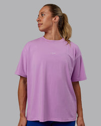 Woman wearing Go-To FLXCotton Oversized Tee - Light Violet-White