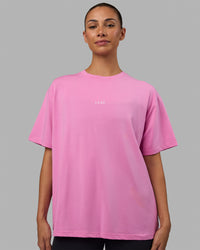 Woman wearing Go-To FLXCotton Oversized Tee - Spark Pink-White