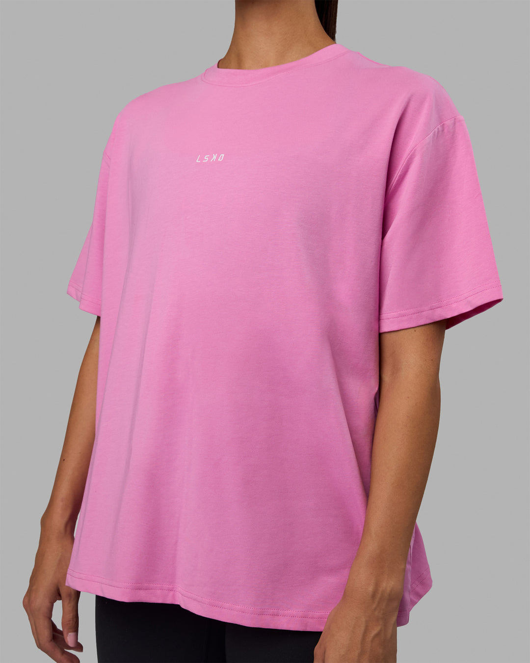 Woman wearing Go-To FLXCotton Oversized Tee - Spark Pink-White
