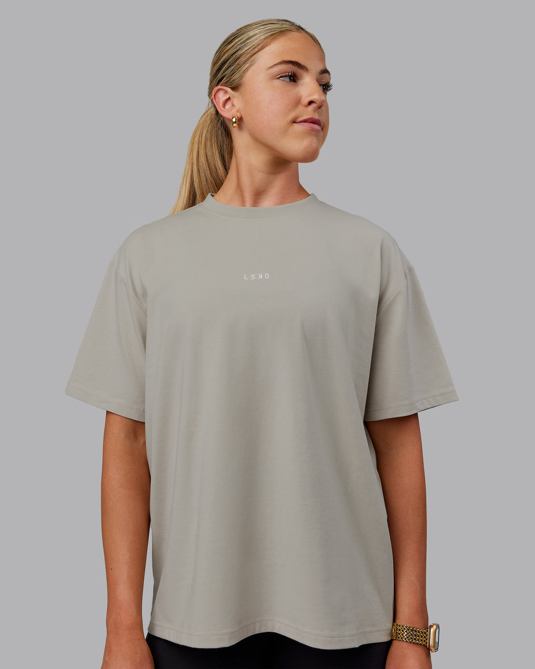 Woman wearing Go-To FLXCotton Oversized Tee - Shale Beige