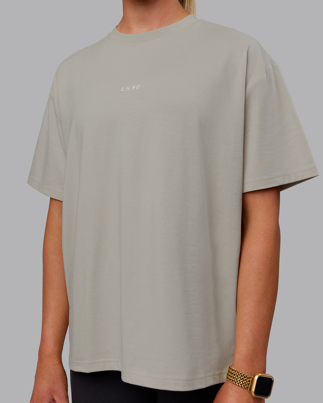 Woman wearing Go-To FLXCotton Oversized Tee - Shale Beige